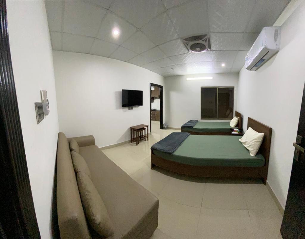 • Faizi Furnished Apartments 费萨拉巴德 外观 照片