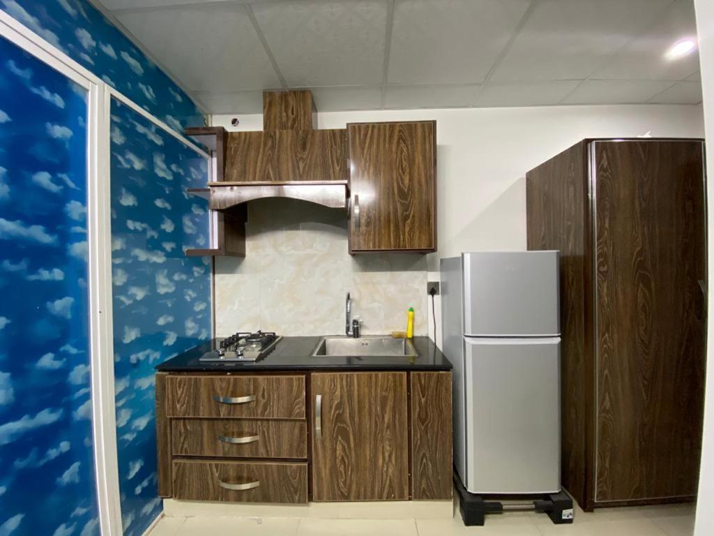 • Faizi Furnished Apartments 费萨拉巴德 外观 照片